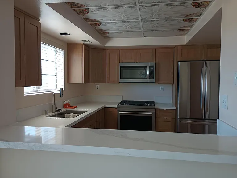 All new kit appliances, quartz counter top, cabinets and flooring