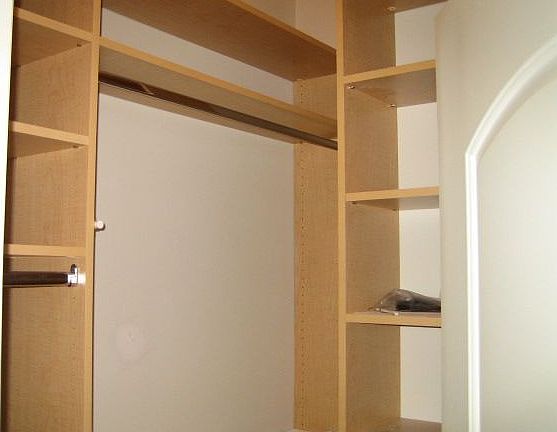 Two Custom Closets in Bedroom