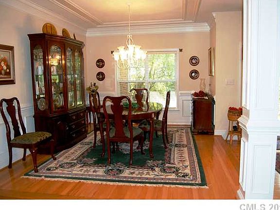 Heavy moldings, tray ceilings and intricate wainscot contribute to the spell-b