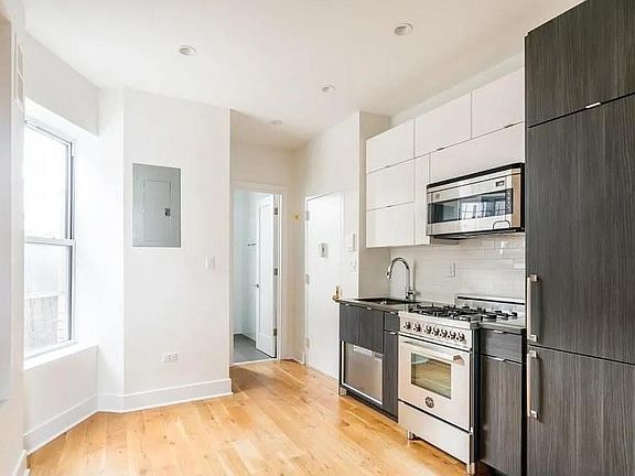 4th image of 66 E 7th St APT 8