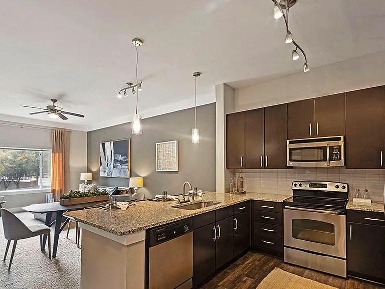 Beautiful interiors with soaring 10' ceilings, wide-plank flooring and open floor plans