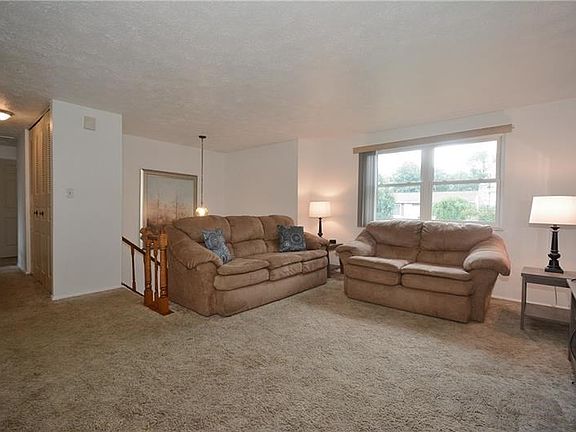 We LOVE the family room with plenty of space for a large cozy sectional, coffee table, end tables, and a large TV unit. Plus, yo