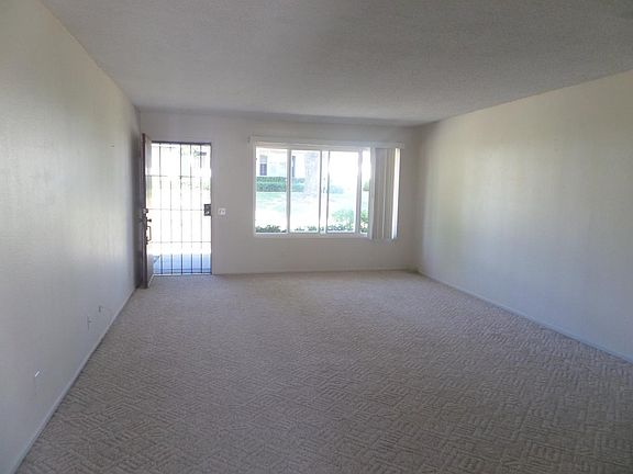View of living room dining room area from kitchen