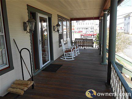 Ipe hardwood front porch with swing