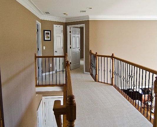 Upstairs balcony overlooking family room