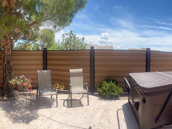 outside hang out area with jacuzzi