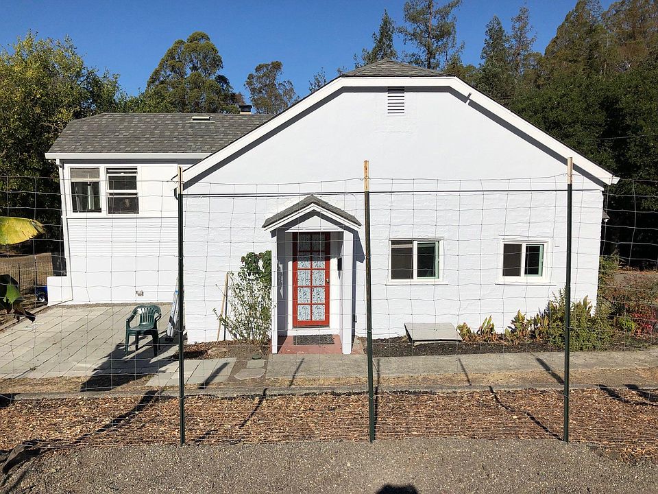 Front door with patio on left