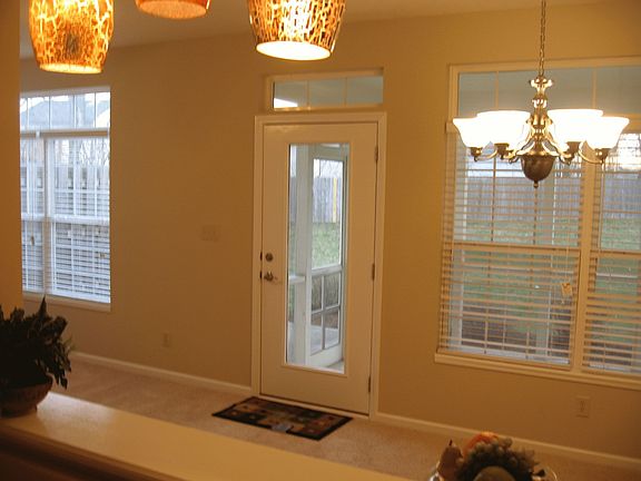 View from Kitchen of dining & porch