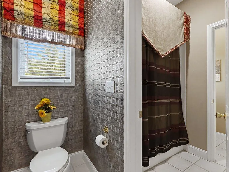 Jack and Jill bathroom - Shared shower but each side has it's own vanity / toilet.
