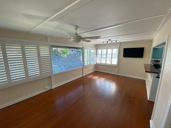Entering into the Main Living Area. Heat reducing tint and custom-designed privacy laminate on the home's original front window.