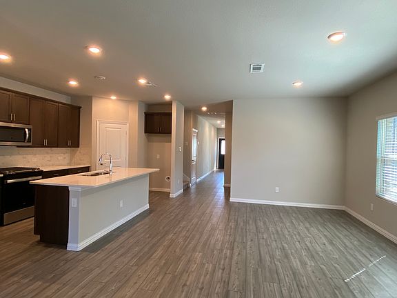 Open floor plan kitchen back to front view