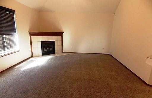 Living room, new paint and new carpet