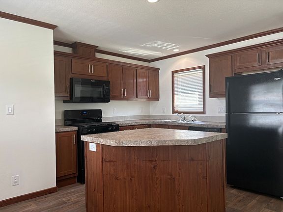 4th image of 2431 SE Four Seasons Dr