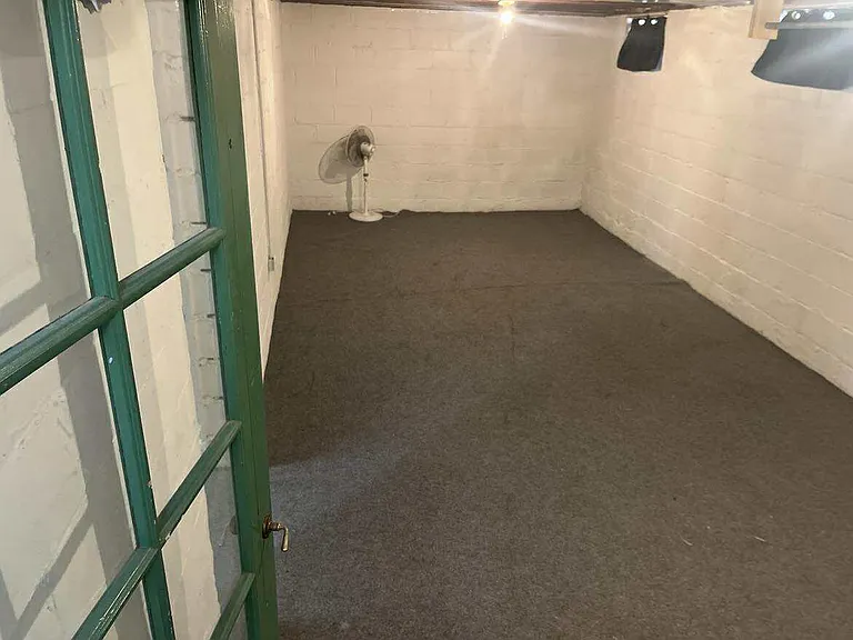 Basement. In the other room is the washer and dryer