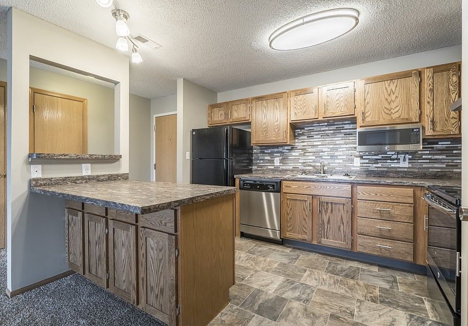 Our renovated kitchens are designed to impress with updated cabinetry, sleek countertops, stainless steel appliances, and a modern tile backsplash that brings it all together.