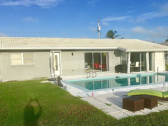 backside with huge pool