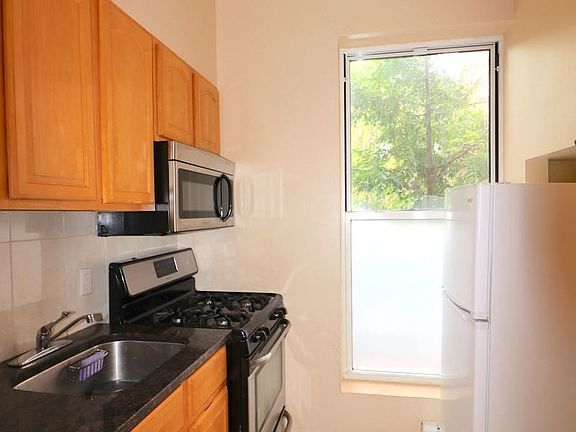 4th image of 322 E 4th St APT 1F
