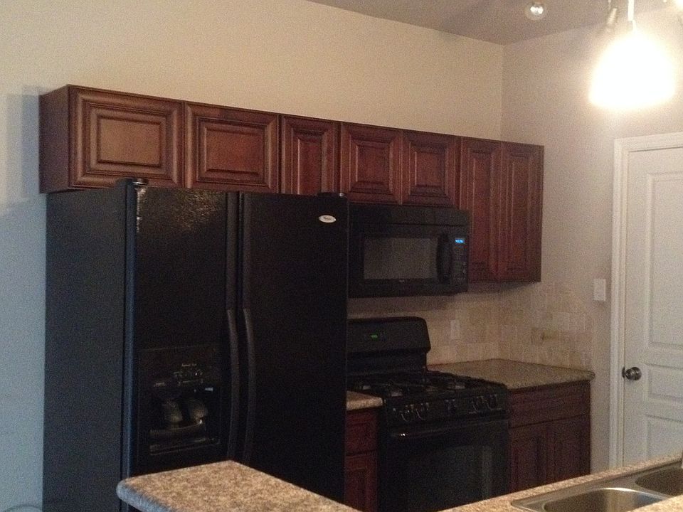 Granite counter top, black appliances