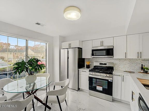 2nd image of 34 Portland Pl #34