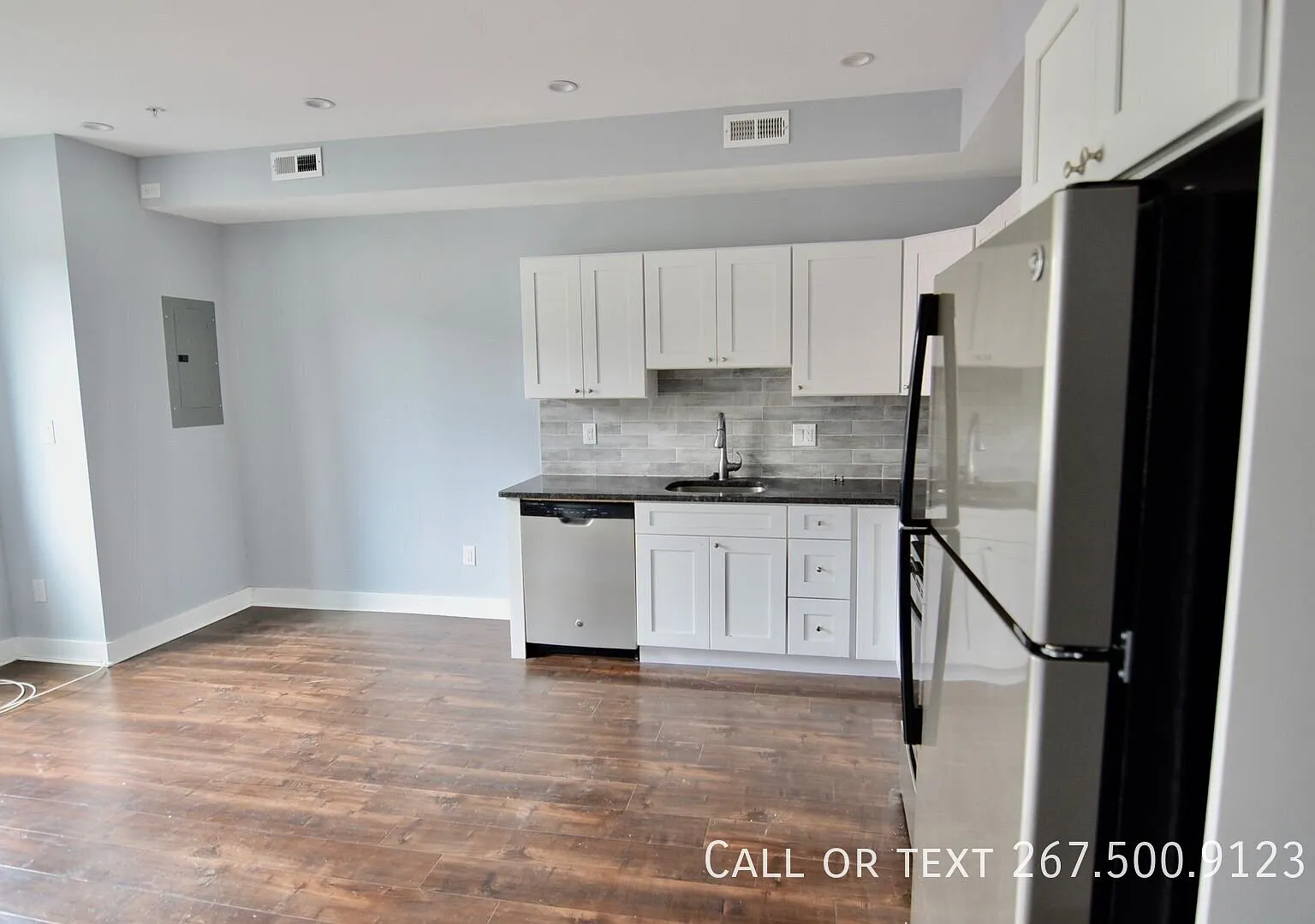 New Construction! Bi-Level two bedroom with a Roof Deck!! Great view. W/D. — Photo 3