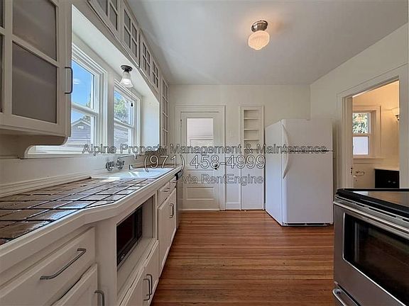 5th image of 6425 N Curtis Ave