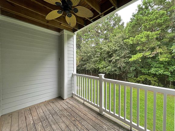 Large Covered Balcony with Ceiling Fan