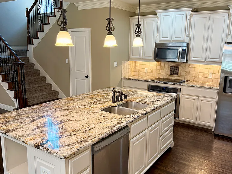 Kitchen with refrigerator included