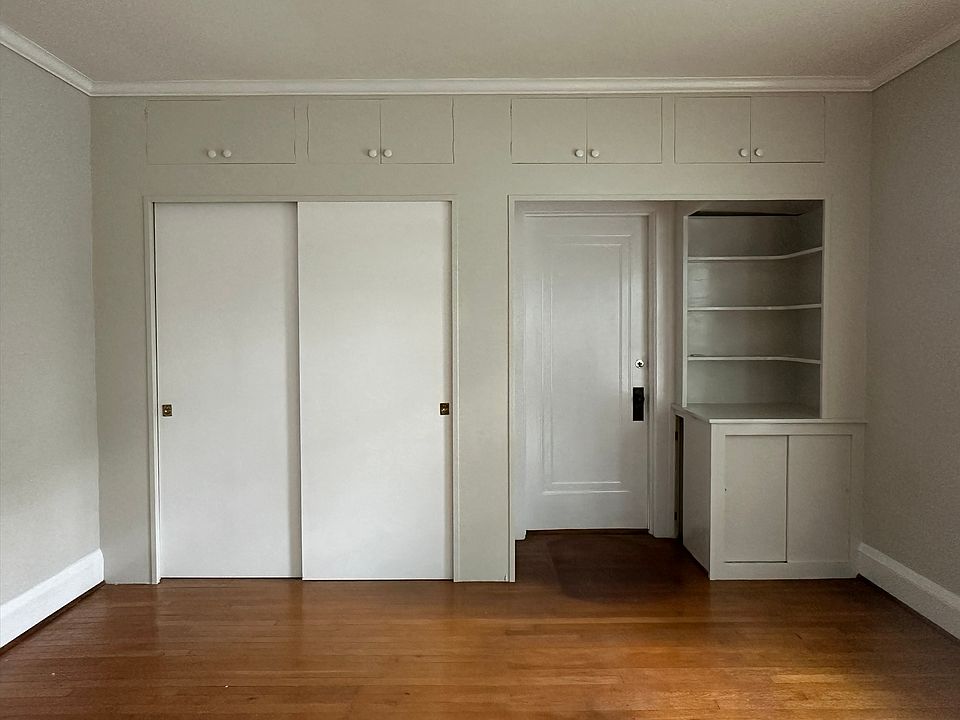 Living Room built-in coat closet & shelves