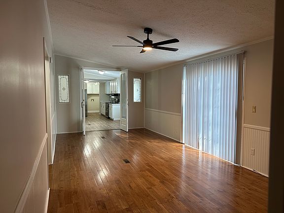 Den with view into kitchen