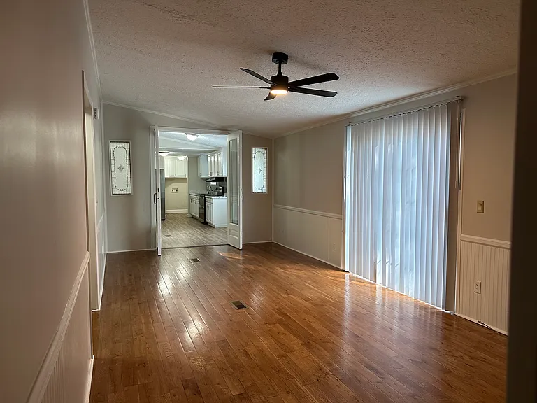 Den with view into kitchen