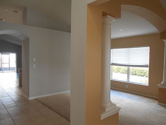 View from foyer to kitchen and family room (far left).