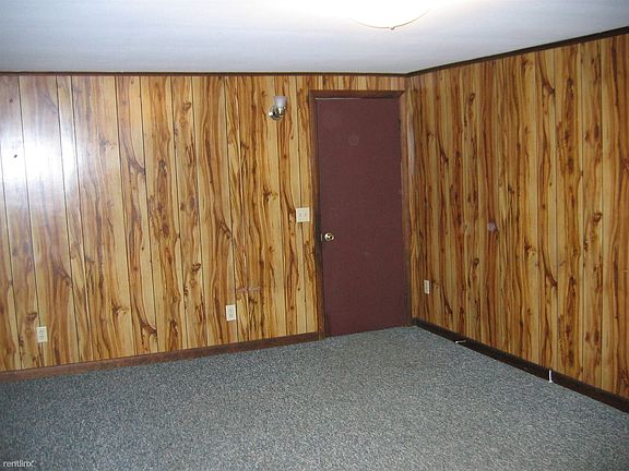 Living room (11.5 x 18 ft.) looking toward door to stairs le
