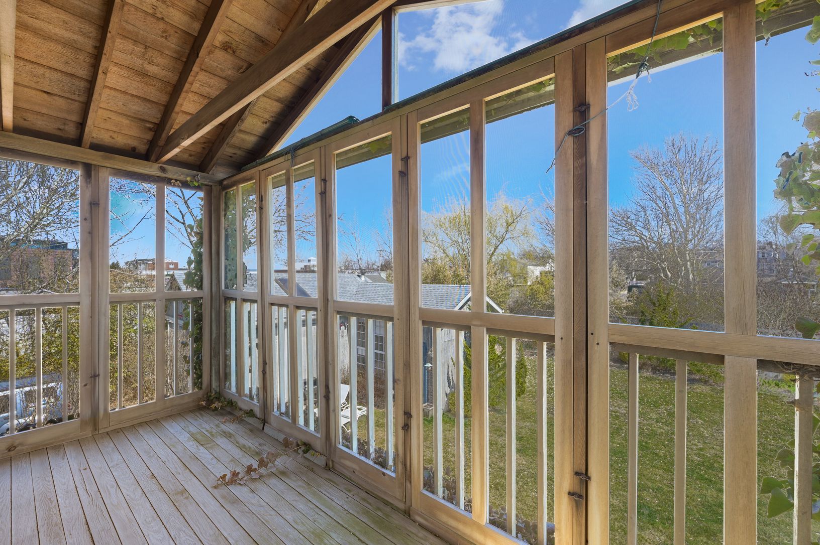  Second Floor Primary Bedroom with Screened Balcony