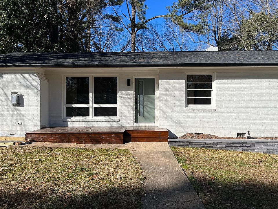 Welcome home! Freshly painted exterior, new front door, new roof and new deck as well as new landscaping along foundation.