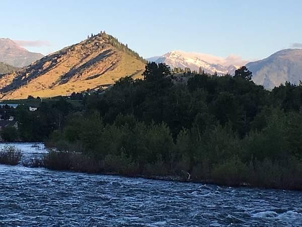 Early morning view of Cashmere Mountain, as the sun comes up, across parking lot from Unit 2.