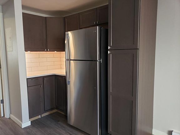 Additonal kitchen counter space with generous storage space.
