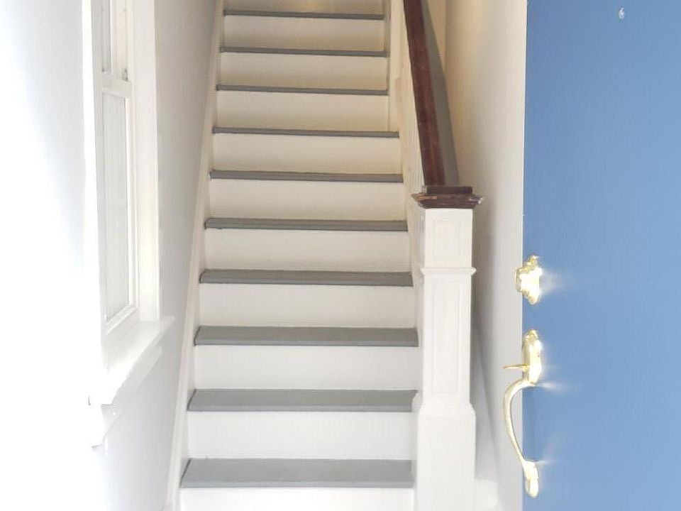 Entrance foyer with space for coat/shoe storage.