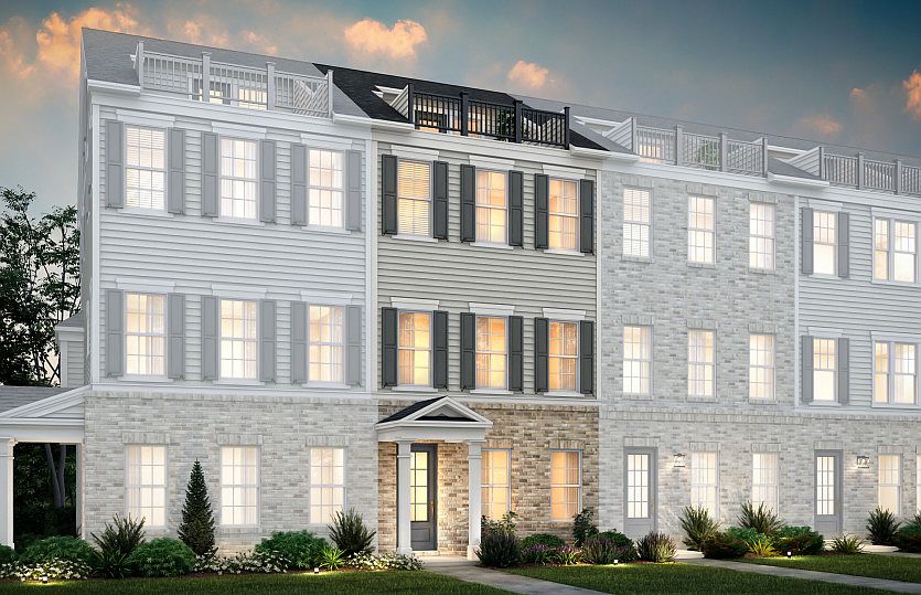 Broxton Exterior 71 features James Hardie TM siding, brick, covered front door, terrace and 2 car r