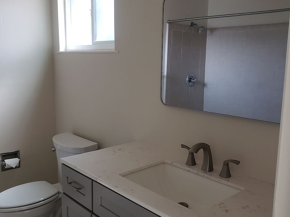 Tile floor and shower/tub enclosure, new vanity, cultured marble counter