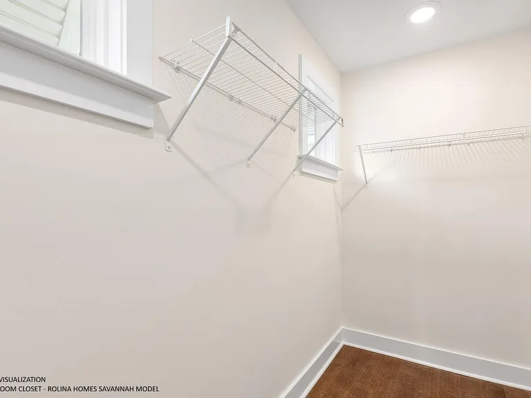PRIMARY BEDROOM CLOSET PICTURE FROM A DIFFERENT SAVANNAH MODEL RECENTLY BUILT BY ROLINA HOMES
