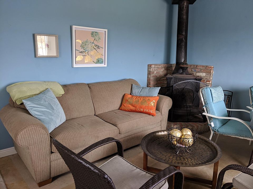 Comfy main room, bright and sunny.