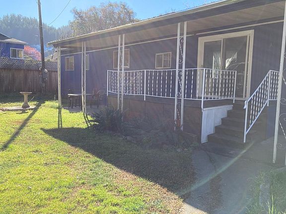 Front Deck Patio overlooking large sun-filled garden with apple trees