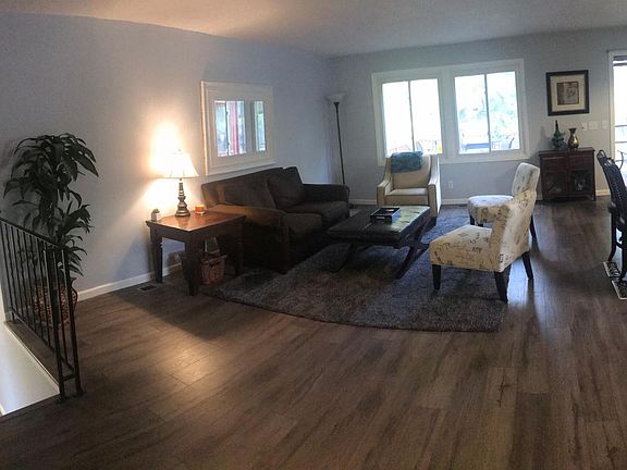 Beautiful, open living room that flows into the kitchen