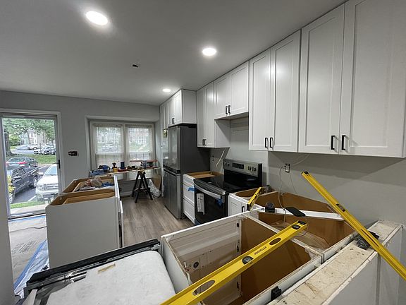 You are going to love the open design. Built-in microwave, under-counter lights, and Quartz counters coming soon