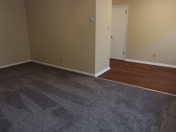 View of living room & partial kitchen area