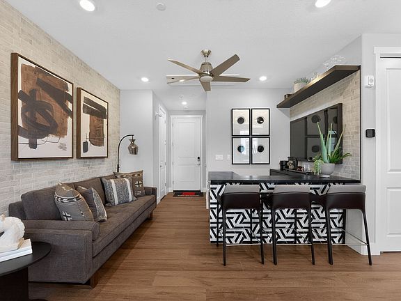 Residence 3 Entrance Living Shown with Built in Bar