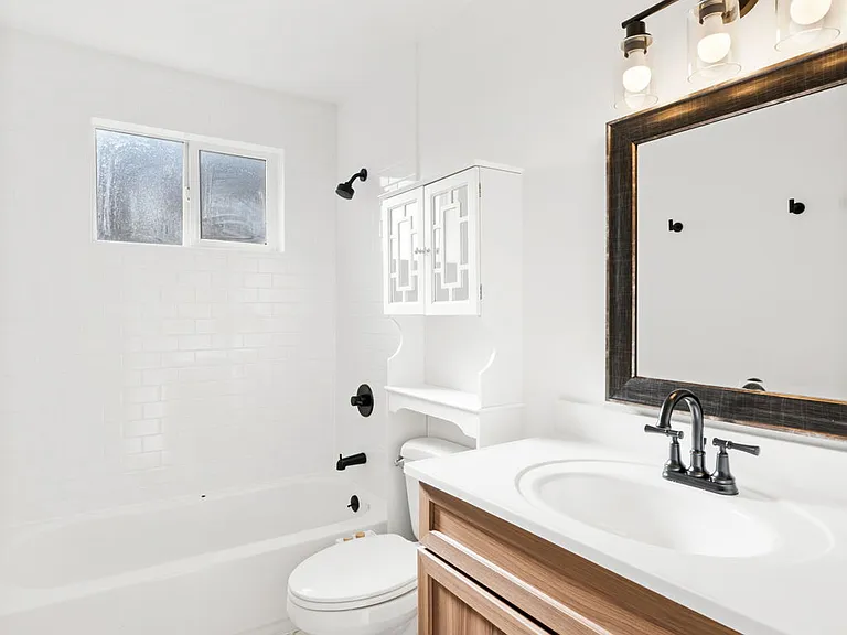 new tile, vanity and bathroom fixutres