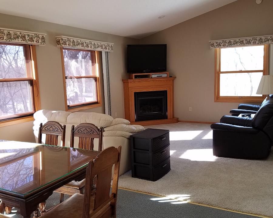Living and dining rooms, furnishings not included.