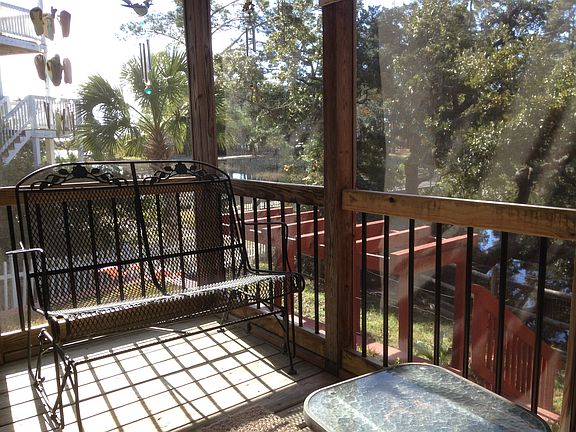 Screened porch off of Den