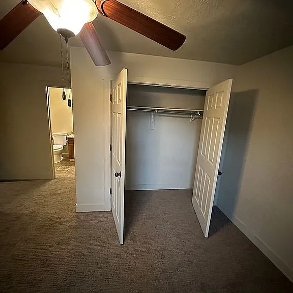 Master bedroom alternate view showing closet,